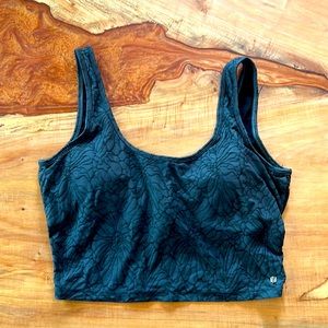 Fabletics Medium Long line bra top. Black and gray lightly textured floral